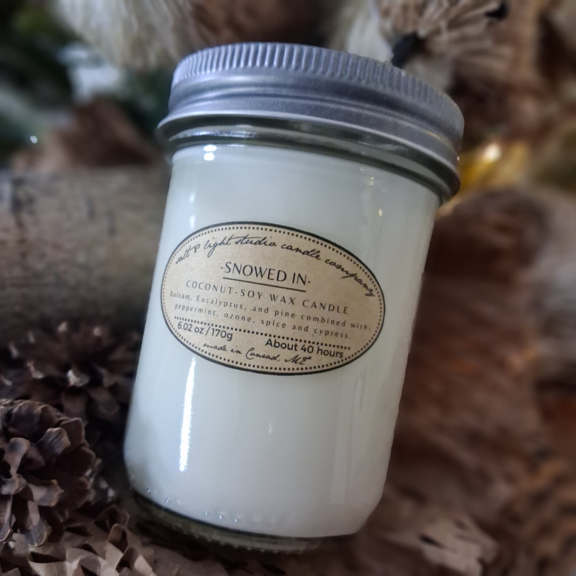 Snowed In coconut soy candle scented with balsam, eucalyptus, pine, peppermint, ozone, spice, and cypress; farmhouse candle in glass mason jar with metal lid